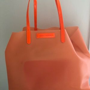 Drunk Elephant Bags Drunk Elephant Orange Silicone Bag With Pocket Poshmark